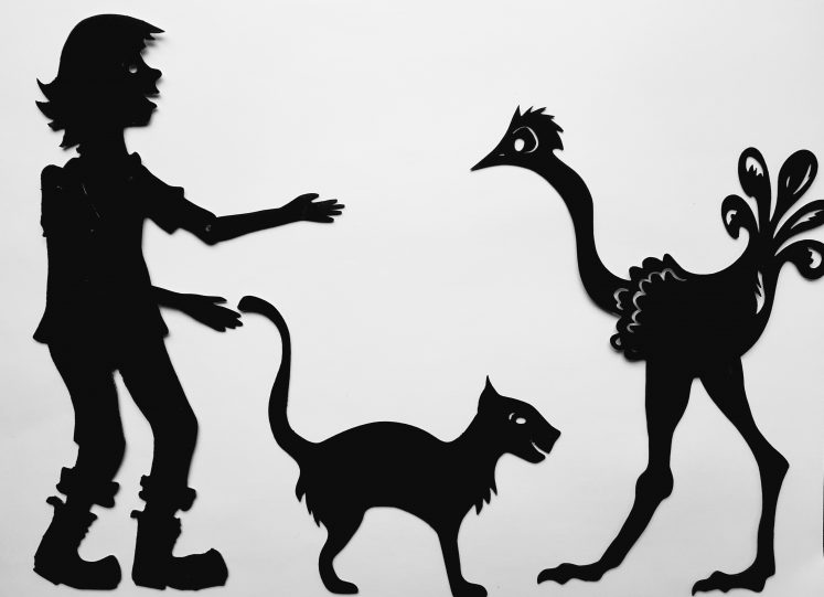 Shadow characters of a girl, a cat and an ostrich