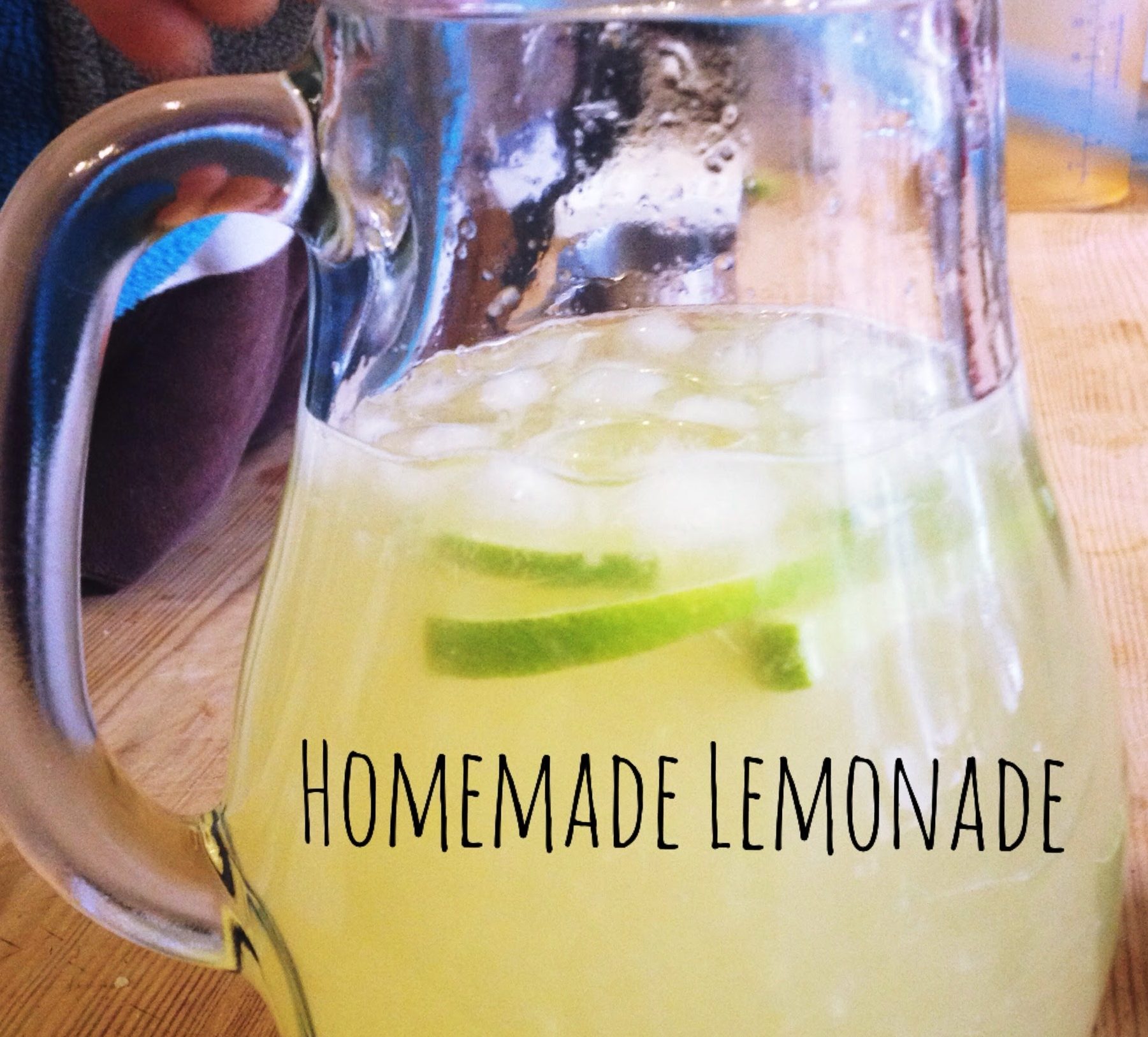 A glass jug of homemade lemonade