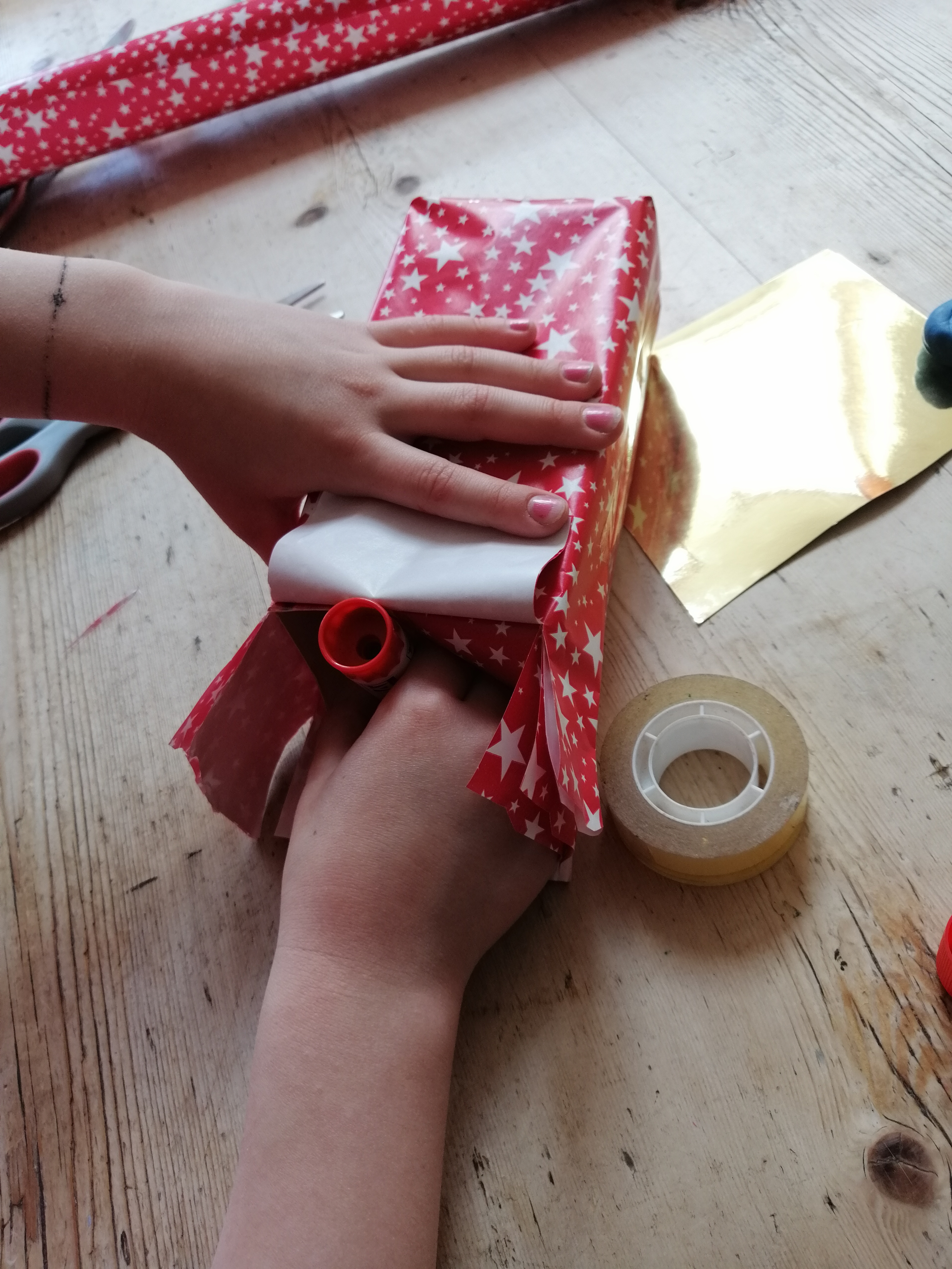 Gluing the paper inside the top of the box