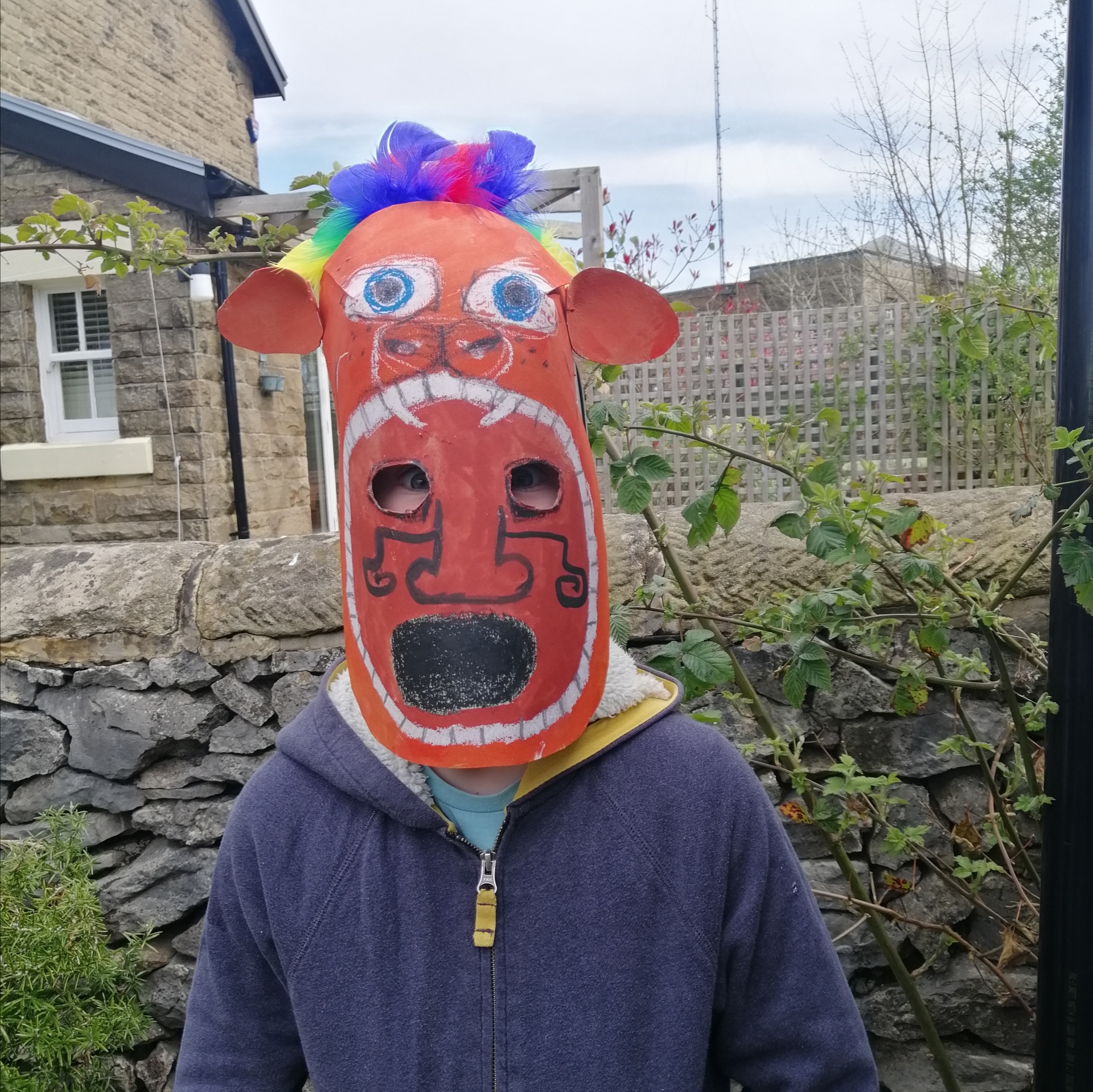 Wearing a mayan mask