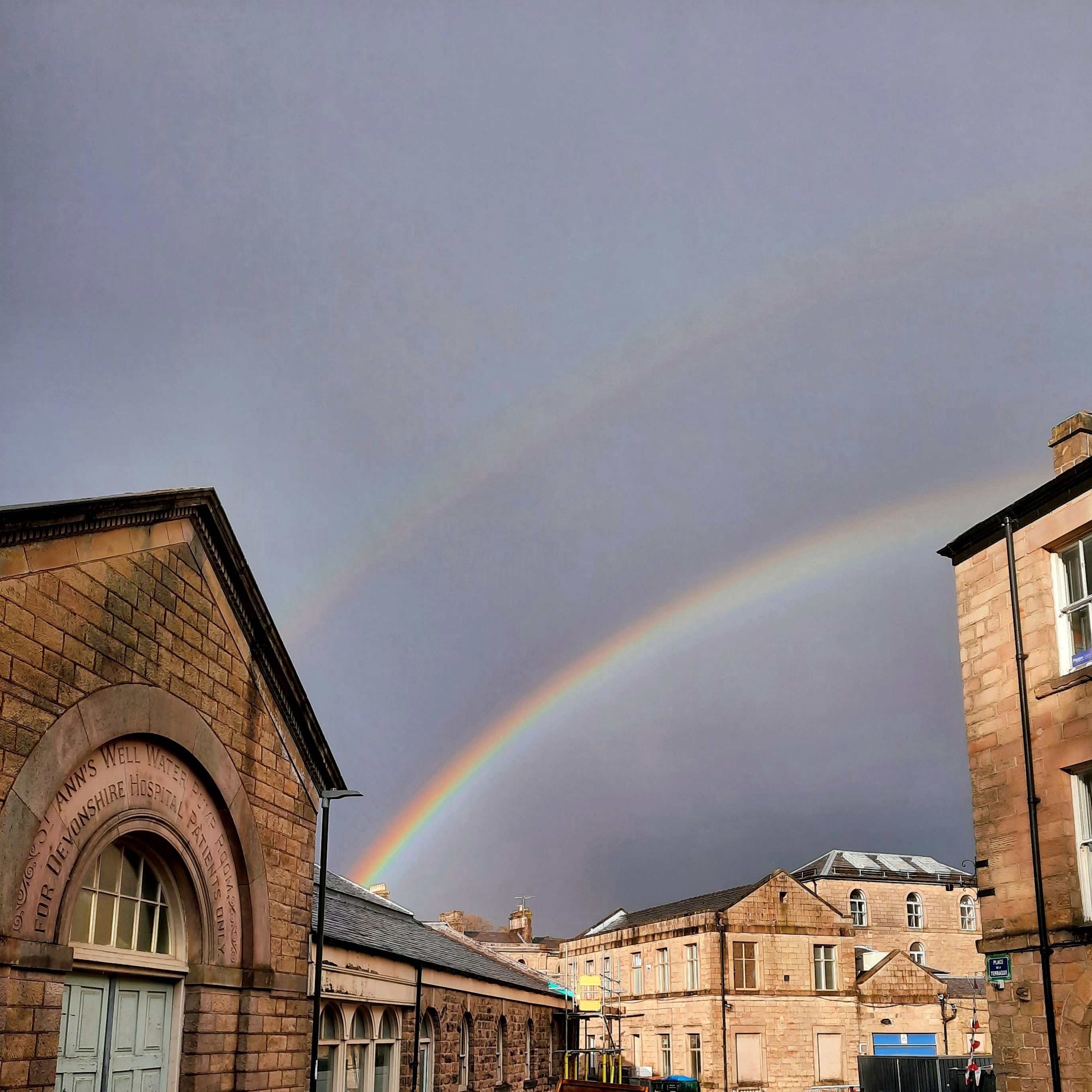 Double rainbow over buxton buildings