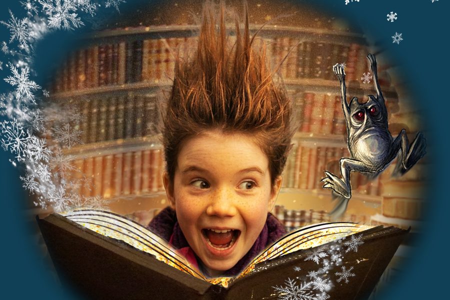 This is a poster for a theatre show. A child looks excitedly into an open book. Snowflakes swirl out of the book and a small monster hangs in the air to one side
